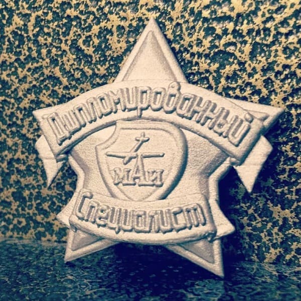 алюминиевый значек